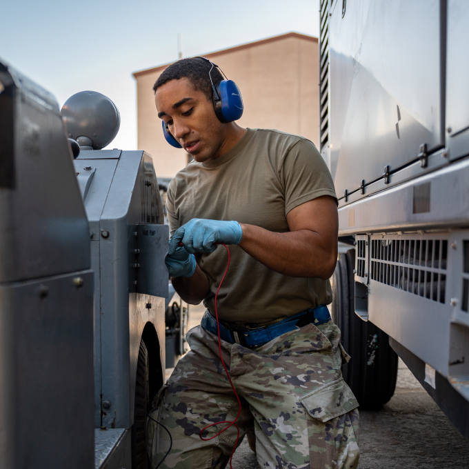 maintainer working on a routine maintenance